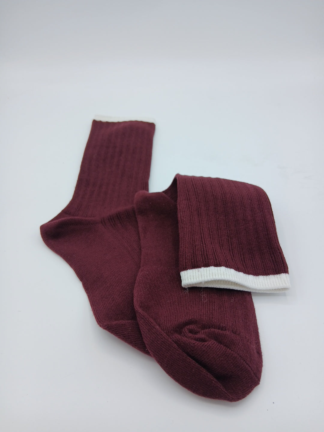 Beige and burgundy colored rim mid calf socks