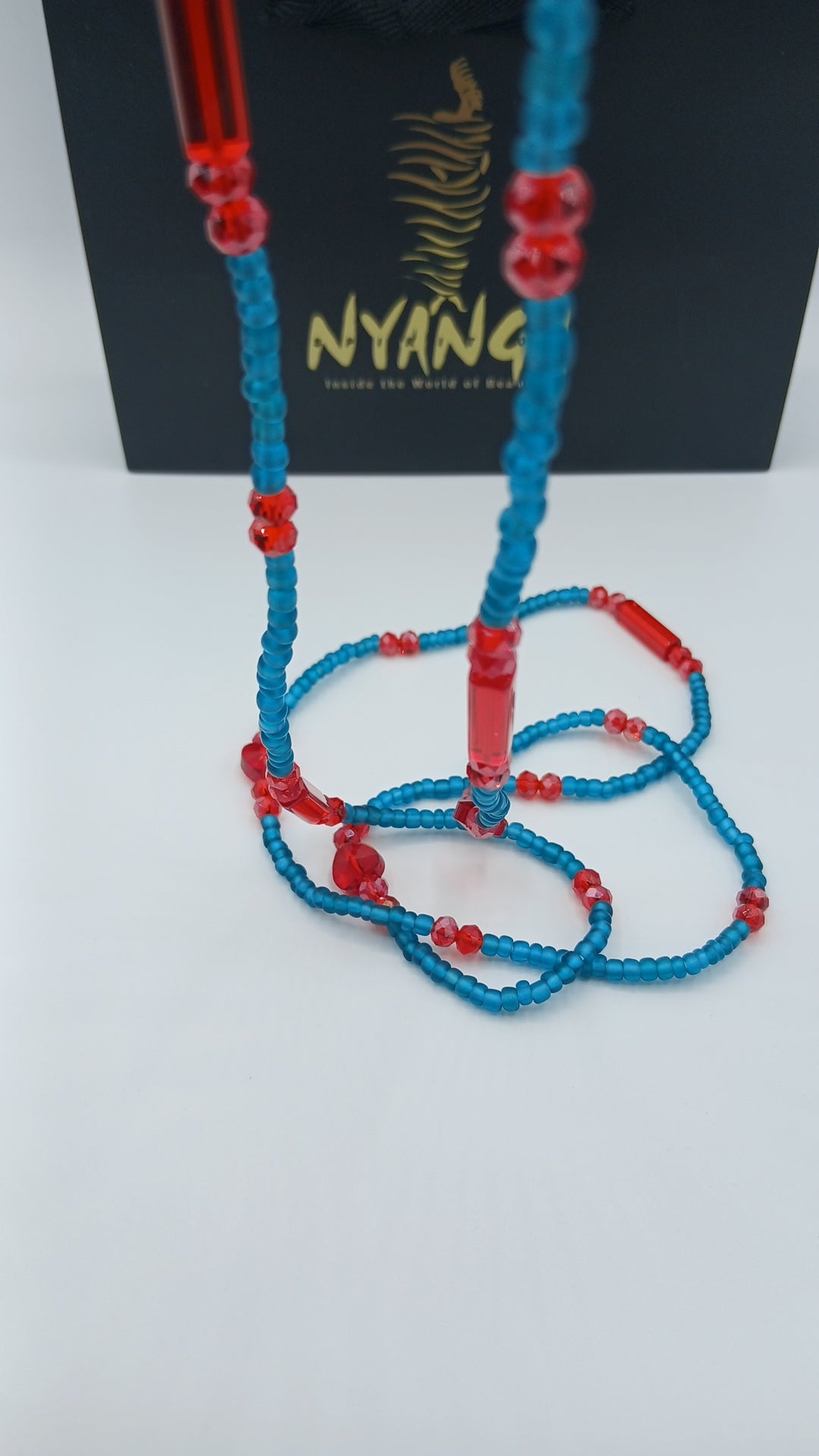 Body jewelry tie-on waist beads one size. Up to plus size.