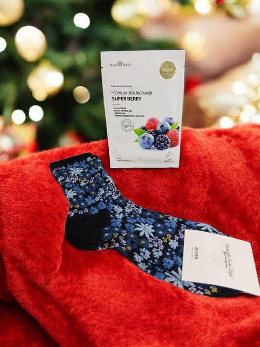 Adore: Super berry face mask and floral socks gift set.